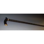 An Anglo-Indian hardwood gentleman's walking cane, curved L-shaped handle with bone fittings,