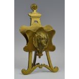 A 19th century brass novelty easel letter rack, cast and applied with the head of a dog, 17cm high,