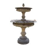 A 19th century design composition two-tier garden fountain, pine cone cresting,