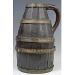 A 19th century coopered jug, loop handle,