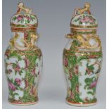 A pair of 19th century Chinese baluster vases and covers,