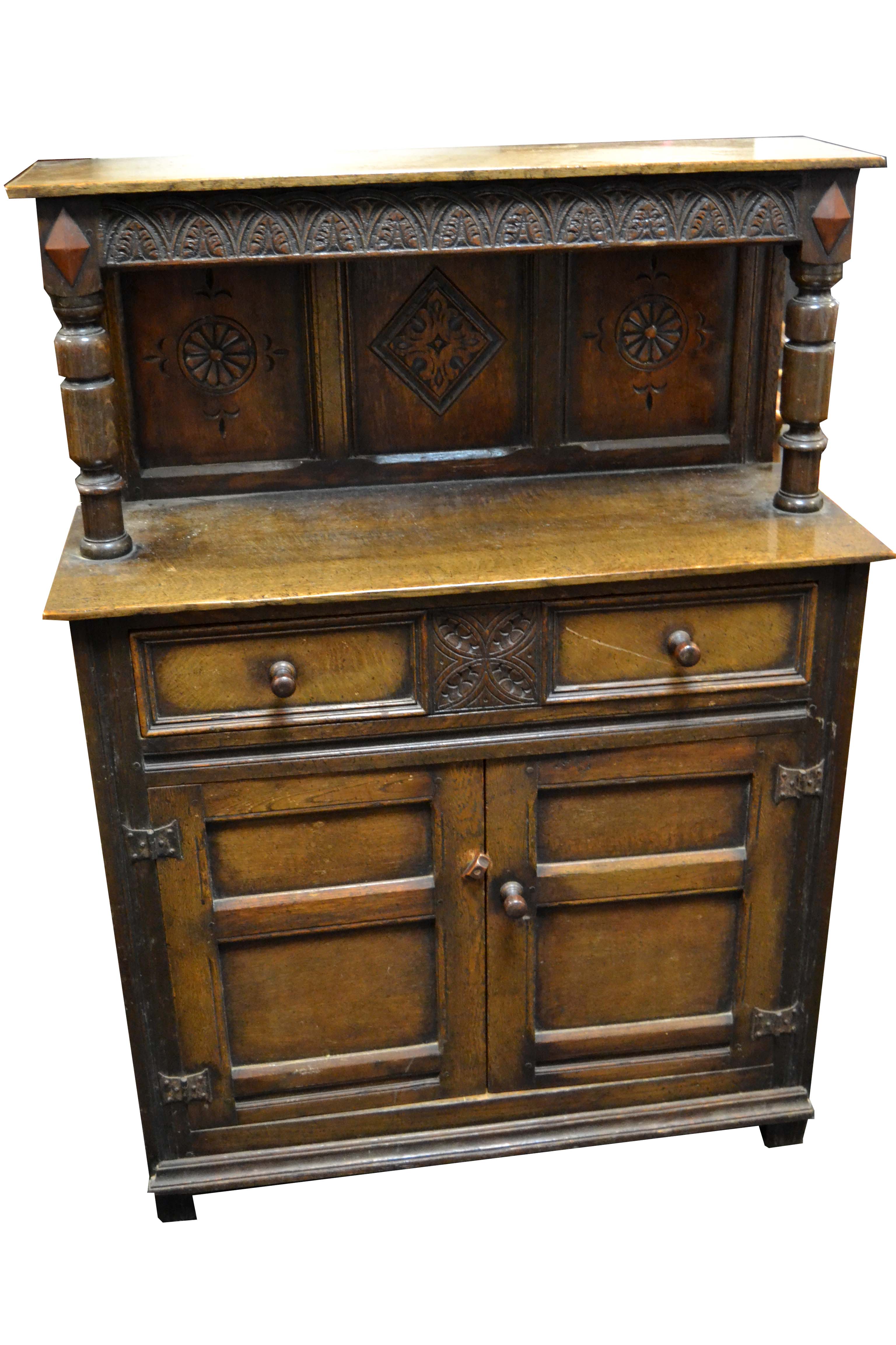 A 17th century design oak court cupboard, of small proportions,