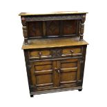 A 17th century design oak court cupboard, of small proportions,