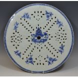 A Chinese strainer plate, pierced,