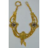 Horse Racing interest - a late 19th/early 20th century gilt metal fancy link watch chain,