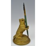 A 19th century gilt bronze novelty pen holder, as a terrier, on hind legs, glass eyes,