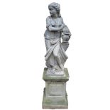 A Baroque design composition garden statue, as a scantily clad female allegorical of Winter,