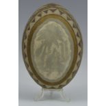 A 19th century Australian cameo carved emu egg, with kangaroos and stiff leaves,