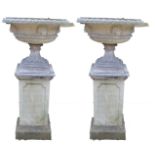 A pair of Regency design composition saucer-shaped garden urns,