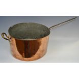 A large Victorian copper pan, steel handle, 71.5cm over handle, 36cm diam, c.