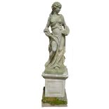 A Baroque design composition garden statue, as a scantily clad female allegorical of The Arts,