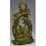 A 19th century bronze country house door stop, cast with a fox mask and hunting regalia,