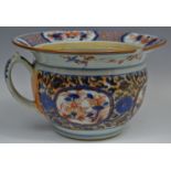 An 18th century Chinese Imari chamber pot, with flared rim,