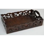 A 19th century rosewood rectangular two handled desk tidy, pierced gallery, 22cm wide, c.