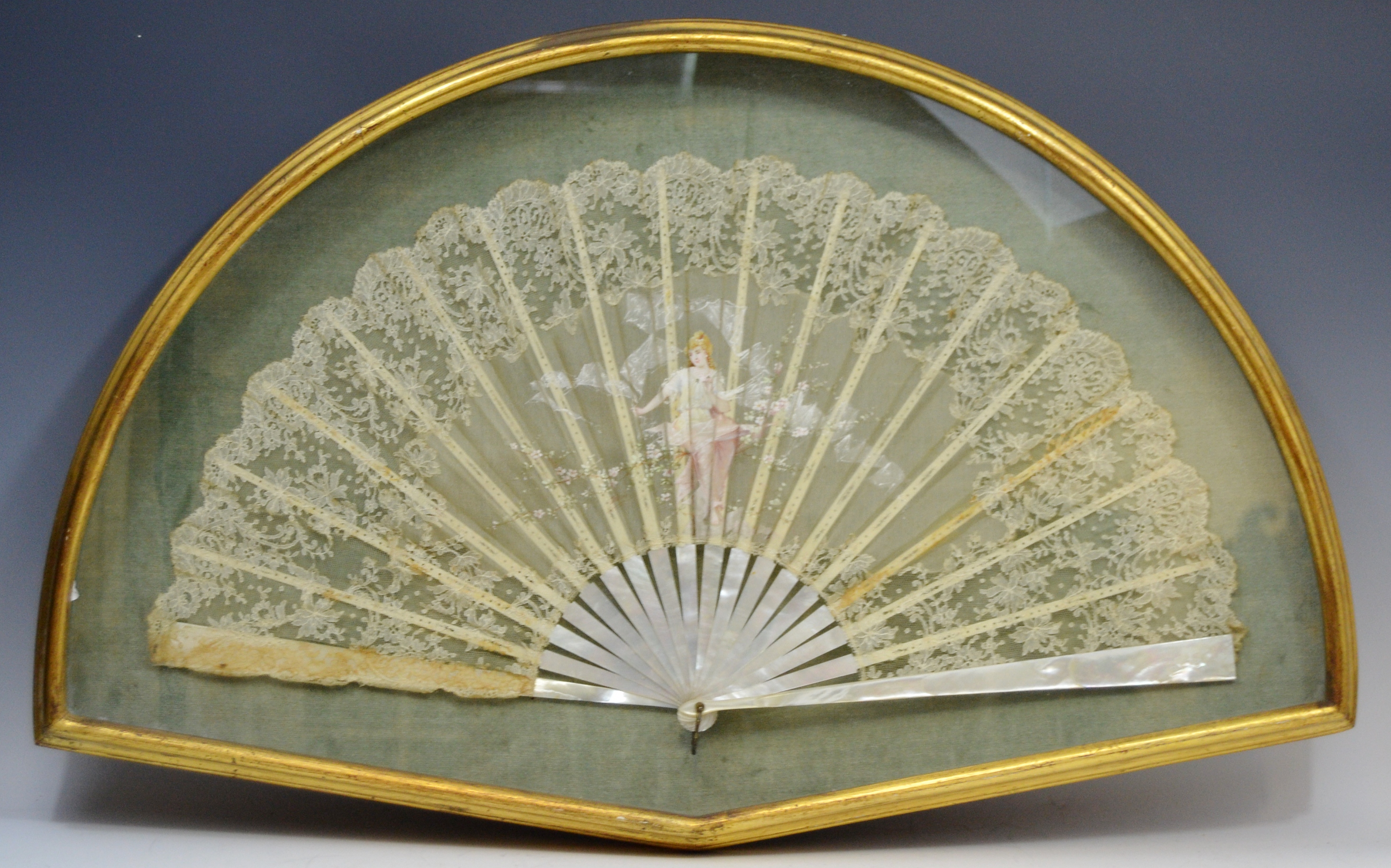 A 19th century lace fan, mother of pearl sticks,