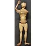 A large artist's articulated lay figure, of typical form and jointed throughout,