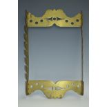 A George III brass wall hanging tavern church warden pipe rack, shaped and pierced borders,