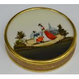 A late 19th century eglomise circular box, the cover painted with a courting couple,