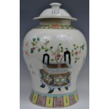 A large Chinese baluster vase and cover, decorated with script,