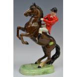 A Beswick huntsman on rearing bay horse, designed by Arthur Gredington, 24.