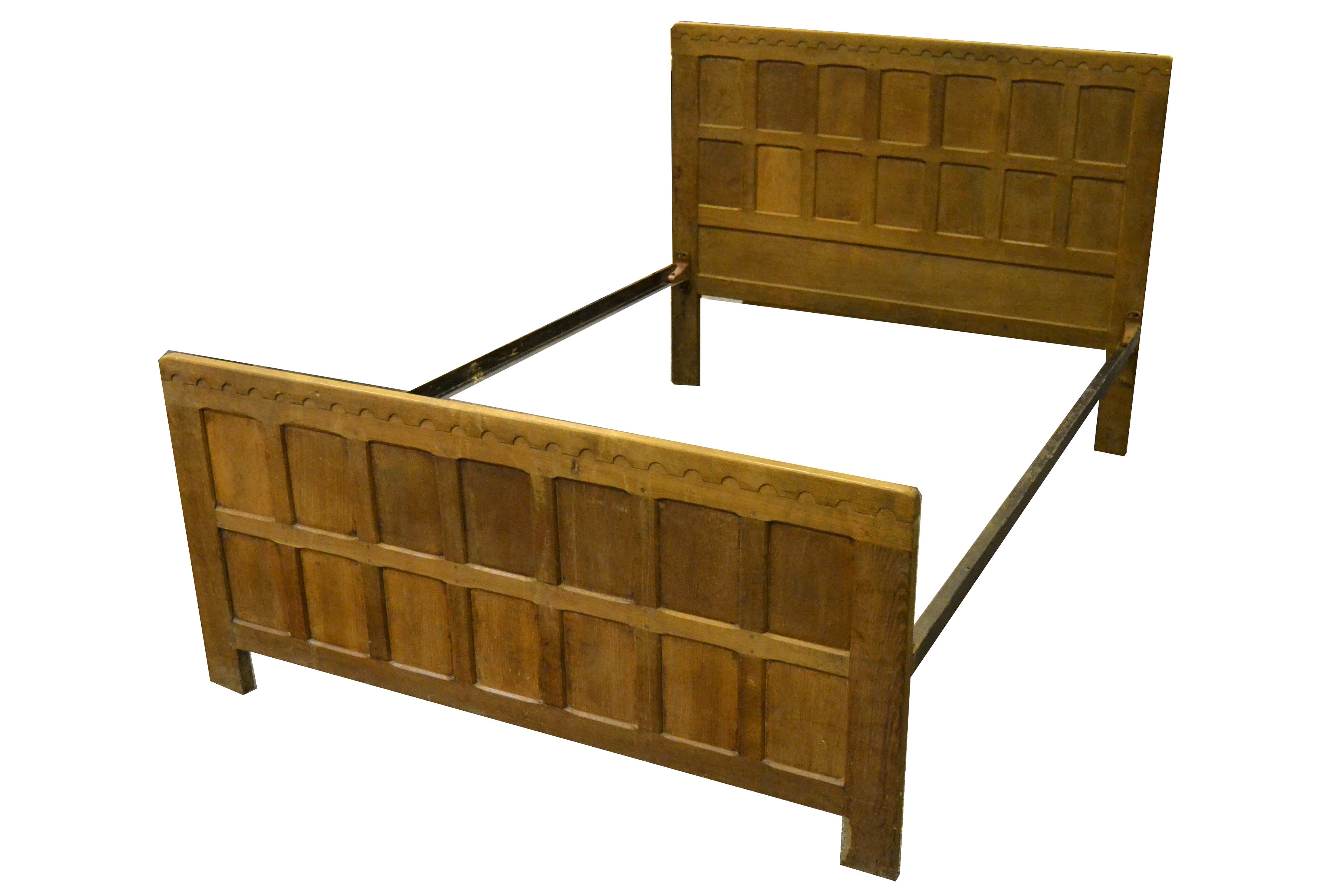 Robert Thompson, Mouseman of Kilburn - an oak double bed and foot board,