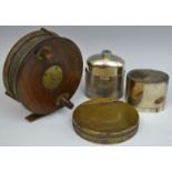 A late 19th/early 20th century mahogany and brass mounted fishing reel, by C. Farlow & Co...