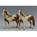 A Beswick Skewbald Pinto pony, designed by Arthur Gredington, 16.5cm high, printed mark, model no.