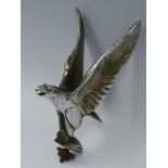 An Art Deco chrome plated car mascot, Alvis, cast as a crested eagle taking flight,