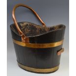 A 19th century brass bound coal bucket, copper swing handle, 37cm wide, c.