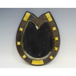 A novelty horse shoe mirror, with brass 'nails',