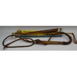 An early 20th century bamboo and horn riding whip, 58cm long; another,
