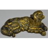 A 19th century brass novelty inkwell, as a Golden Retriever, reclining,