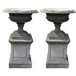 A pair of Regency design composition saucer-shaped garden urns,