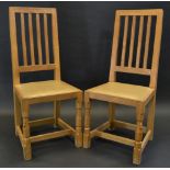 Robert Thompson, Mouseman of Kilburn - a pair of oak dining chairs, rectangular slatted backs,