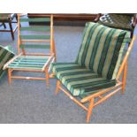 A pair of Ercol easy chairs.