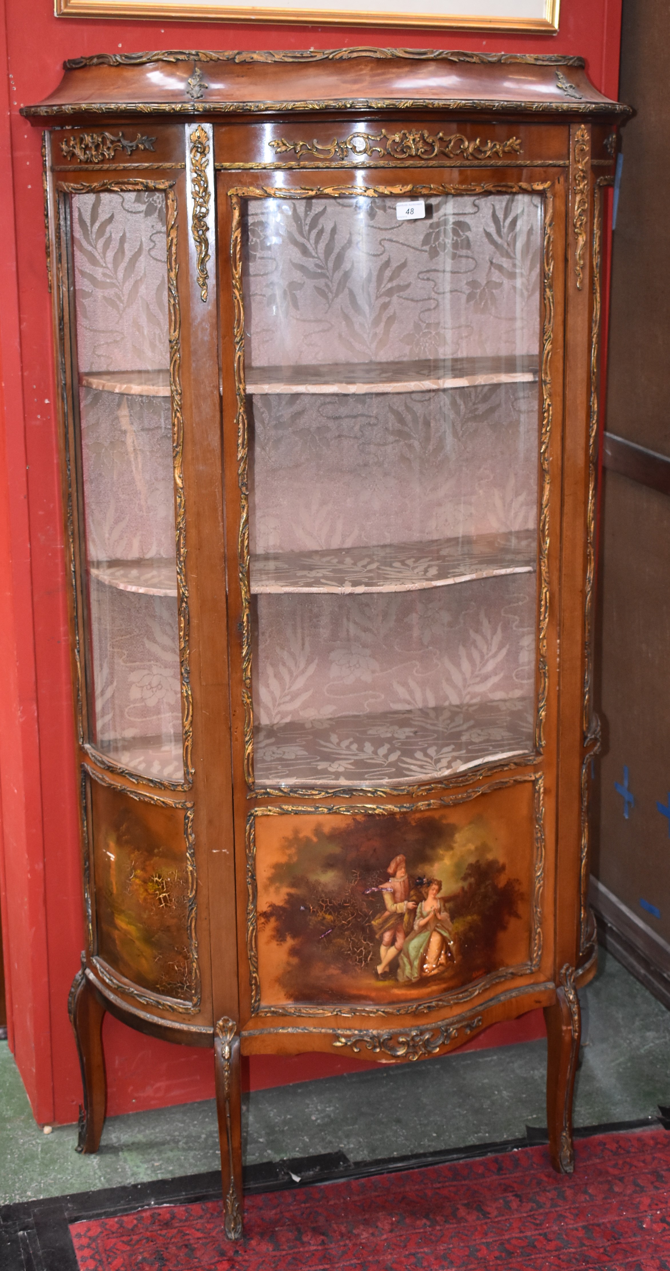 A Louis XV Revival gilt-metal mounted walnut and vernis Martin serpentine vitrine,