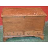A stripped pine mule chest, hinged cover, candle box, two short drawers to base, bracket feet,