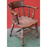 An elm smoker's bow armchair,