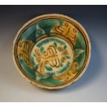 An 18th century tin glazed earthenware bowl, probably Spanish,