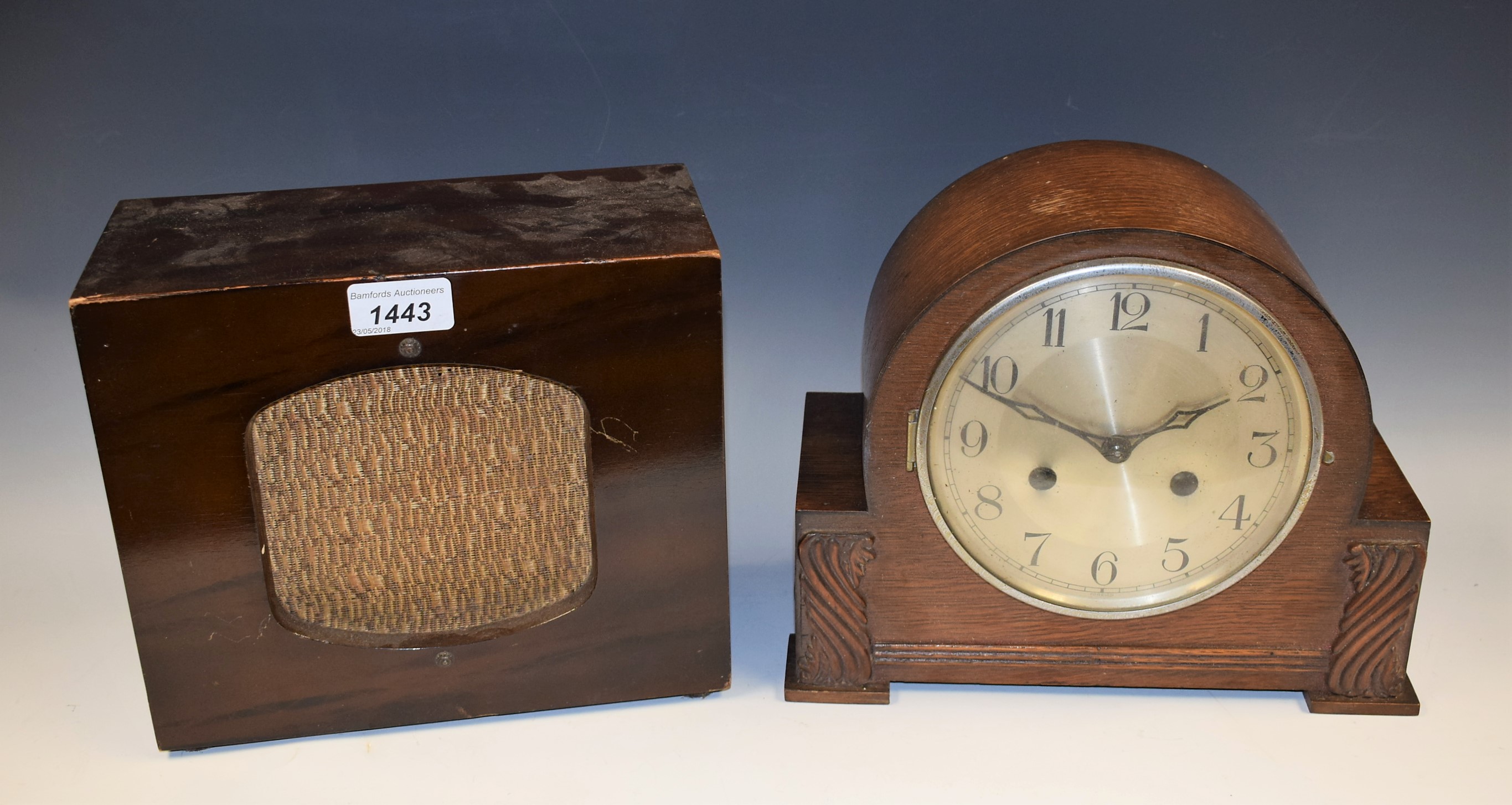An oak mantel clock, twin winding holes,
