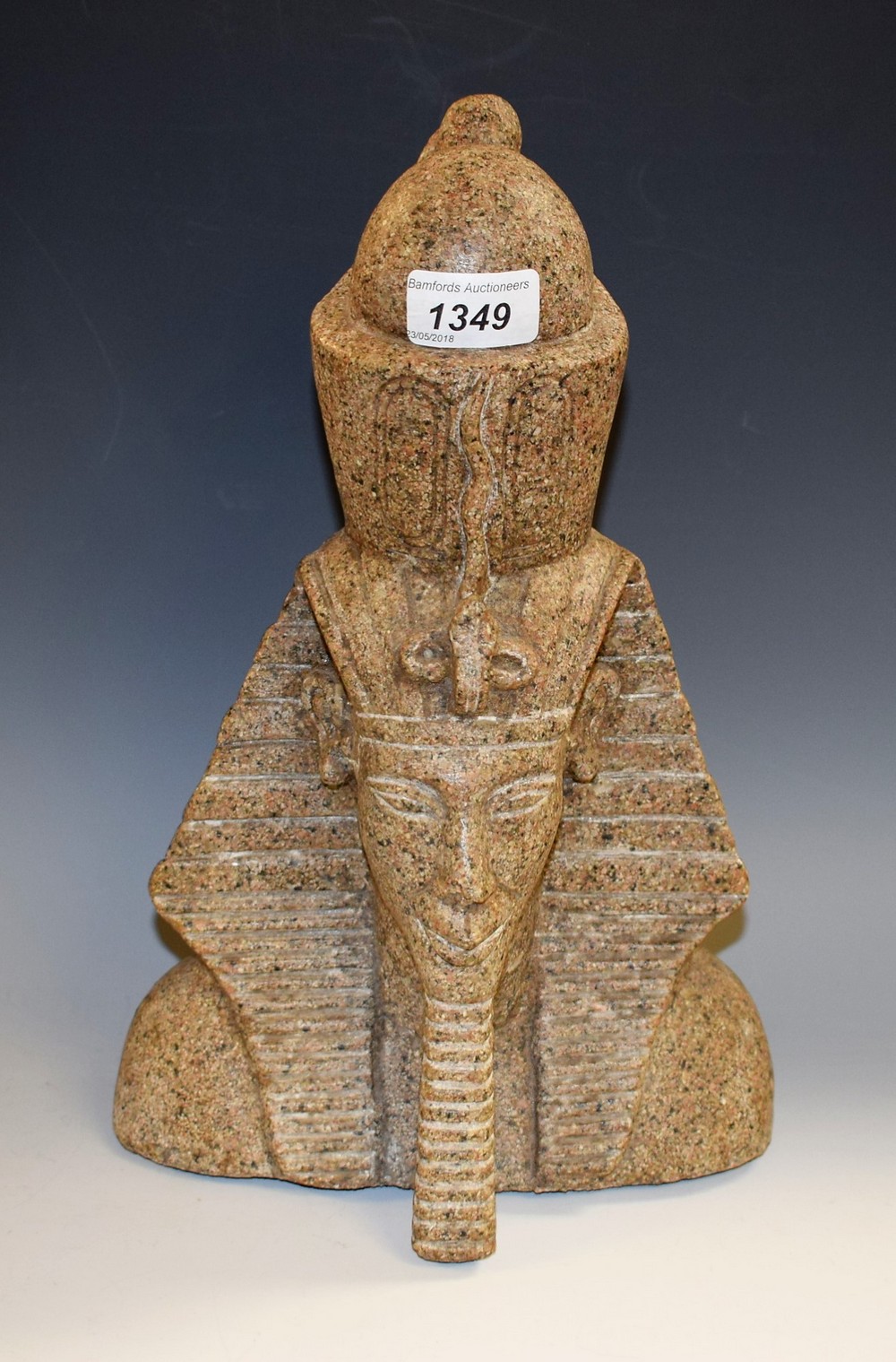A Grand Tour style stone model, carved as a pharoah, 35.