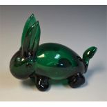 An unusual 19th century green glass model, of a rabbit, 15cm long, c.