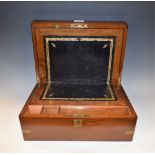 A Victorian mahogany folding writing slope, brass mounted, tooled black leather writing surface,