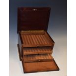 An early 20th century brass mounted mahogany humidor cabinet,