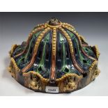 A Majolica ceiling light with lion mask rim