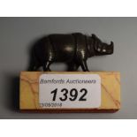 Continental School (19th/early 20th century), a dark patinated cabinet bronze, of a rhinoceros, 6.