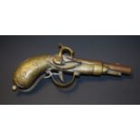 An early 20th century brass novelty letter clip, cast as a flintlock pistol,