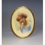 English School, early 20th century, a portrait miniature, of a young lady wearing a blue dress,