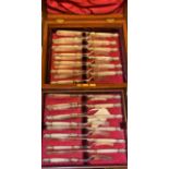 An Edwardian set of twelve close plated mother of pearl hafted fruit knives and forks,