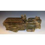 An Indian softwood box, as an ox cart, chip-carved cover,